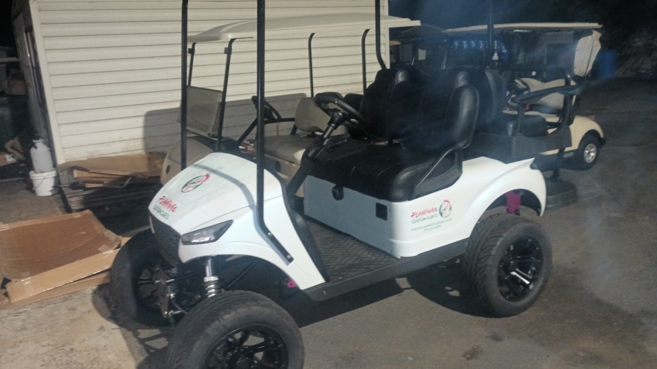 Flamingo Custom Carts golf cart with black wheels and custom graphics, Atlanta area golf cart options