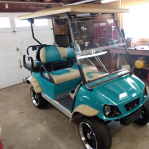 Customized golf cart with premium wheels and unique accessories by Flamingo Custom Carts in Atlanta.