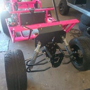 Custom golf cart frame and components during transformation process